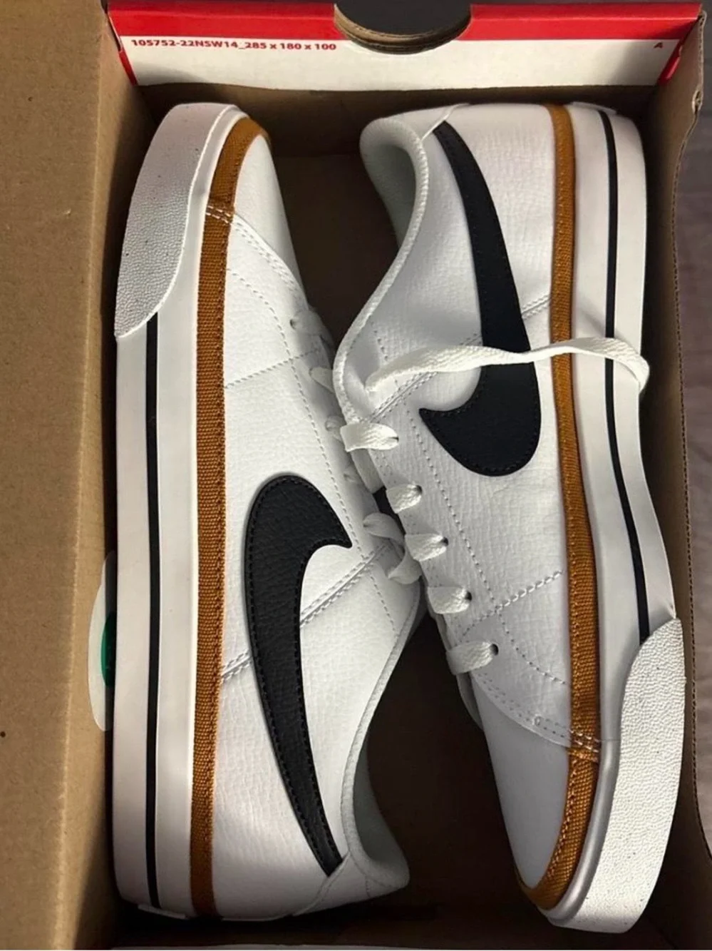 Nike Women’s White Sneakers with Black Swoosh and Brown Trim
